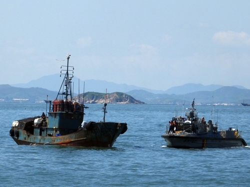 This photo, provided by the Central Regional Coast Guard on Tuesday shows Chinese fishing boats seized for allegedly anchoring without permission for an extended period. (Central Regional Coast Guard)