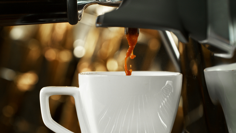 Espresso being extracted on a lever coffee machine [Getty Images Bank]