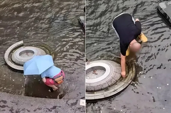 Two people are seen collecting coins tossed into Palseokdam in Cheonggyecheon, Seoul on July 19, in this photograph taken by a visitor. (X)
