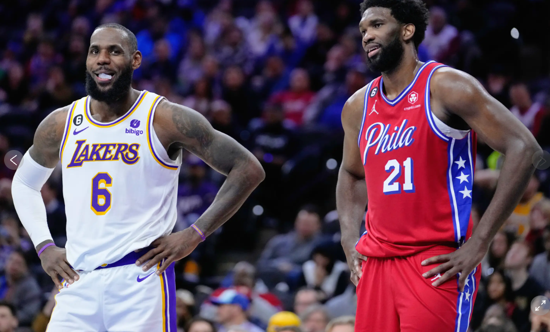 LA Lakers' LeBron James (left) and Philadelphia 75ers' Joel Embiid, during a game in Philadelphia, Dec. 9, 2022. (AP-Yonhap)