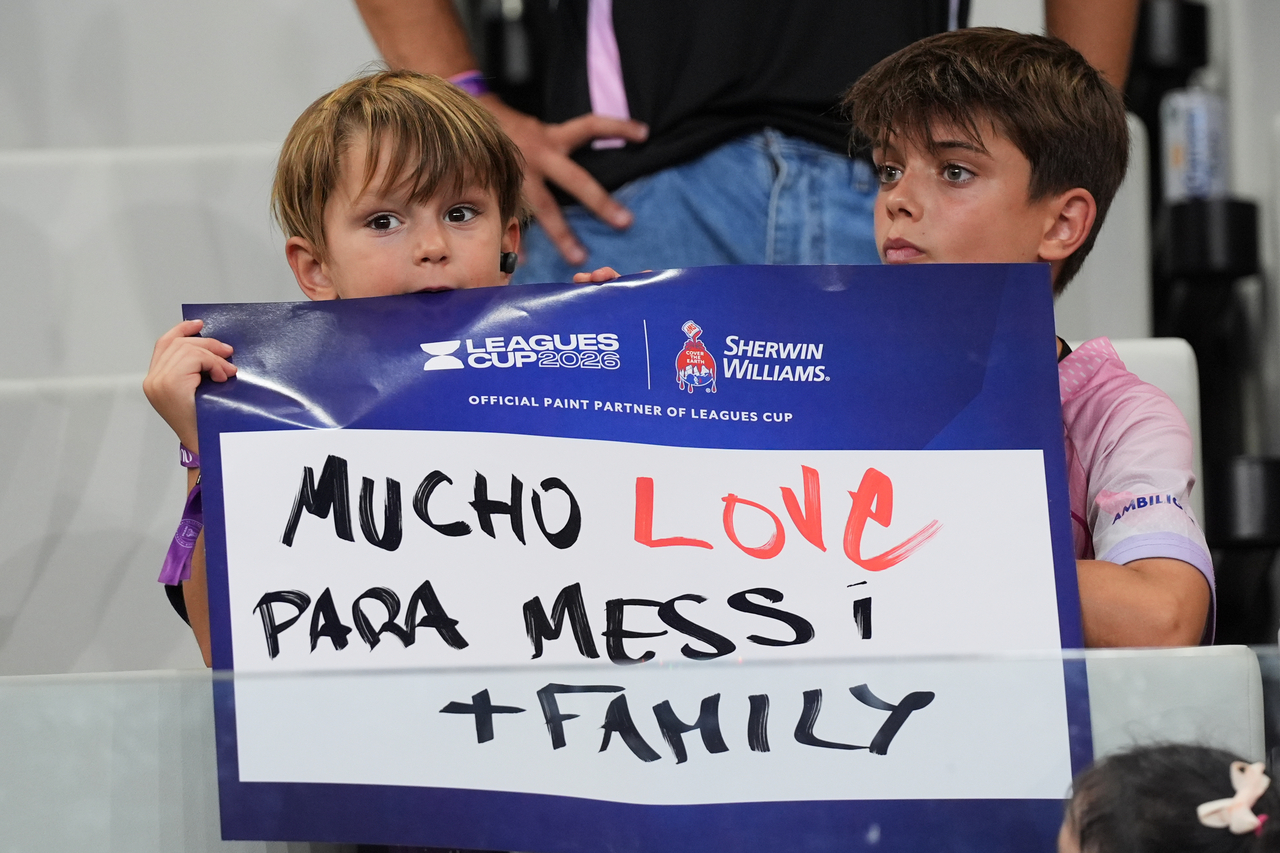 Fans hold a sign in support of Inter Miami forward Lionel Messi, who's father Jorge Messi passed away, before a Leagues Cup soccer match between Inter Miami and Monterrey, Saturday.   (AP-Yonhap)