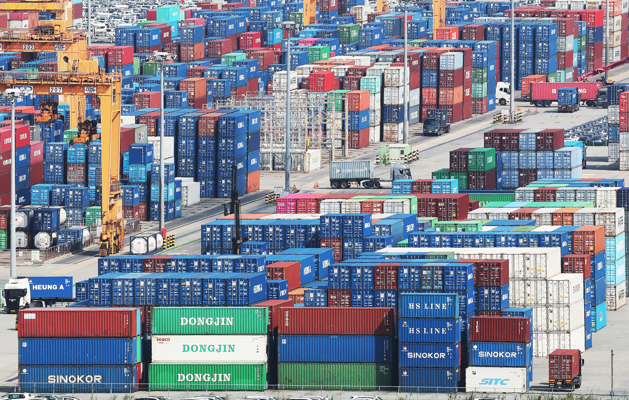 Containers are stacked at a port in Pyeongtaek, around 60 kilometers south of Seoul, in this July 24, file photo. (Yonhap)