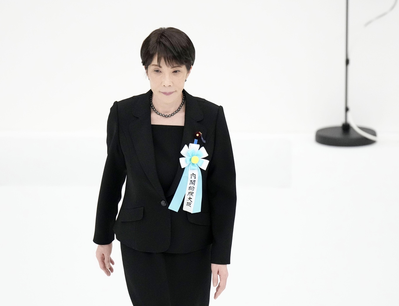 Japanese Prime Minister Sanae Takaichi participates in memorial service for fallen soldiers in Tokyo on Saturday. (Yonhap)