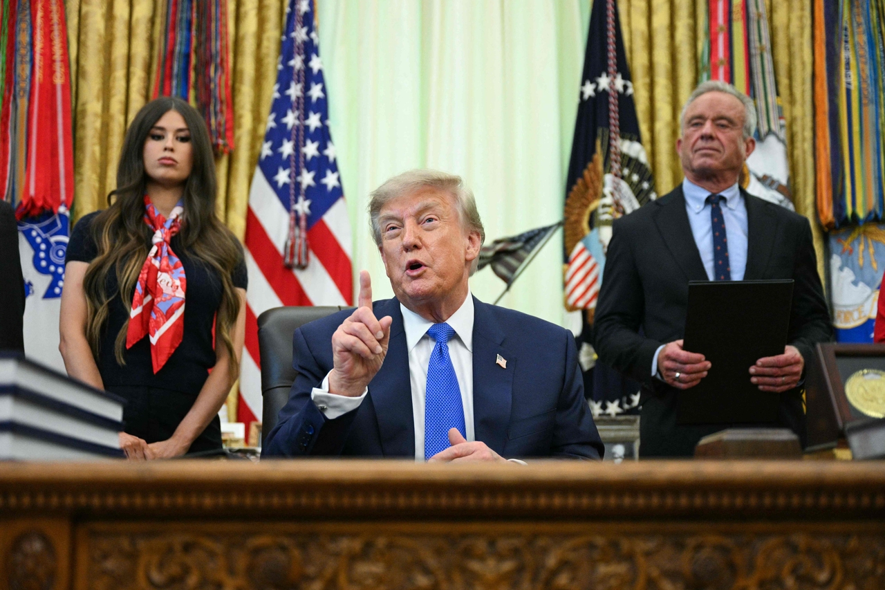 This file photo shows US President Donald Trump speaking after signing an executive order in the Oval Office of the White House in Washington, DC, on August 10. (AFP-Yonhap)