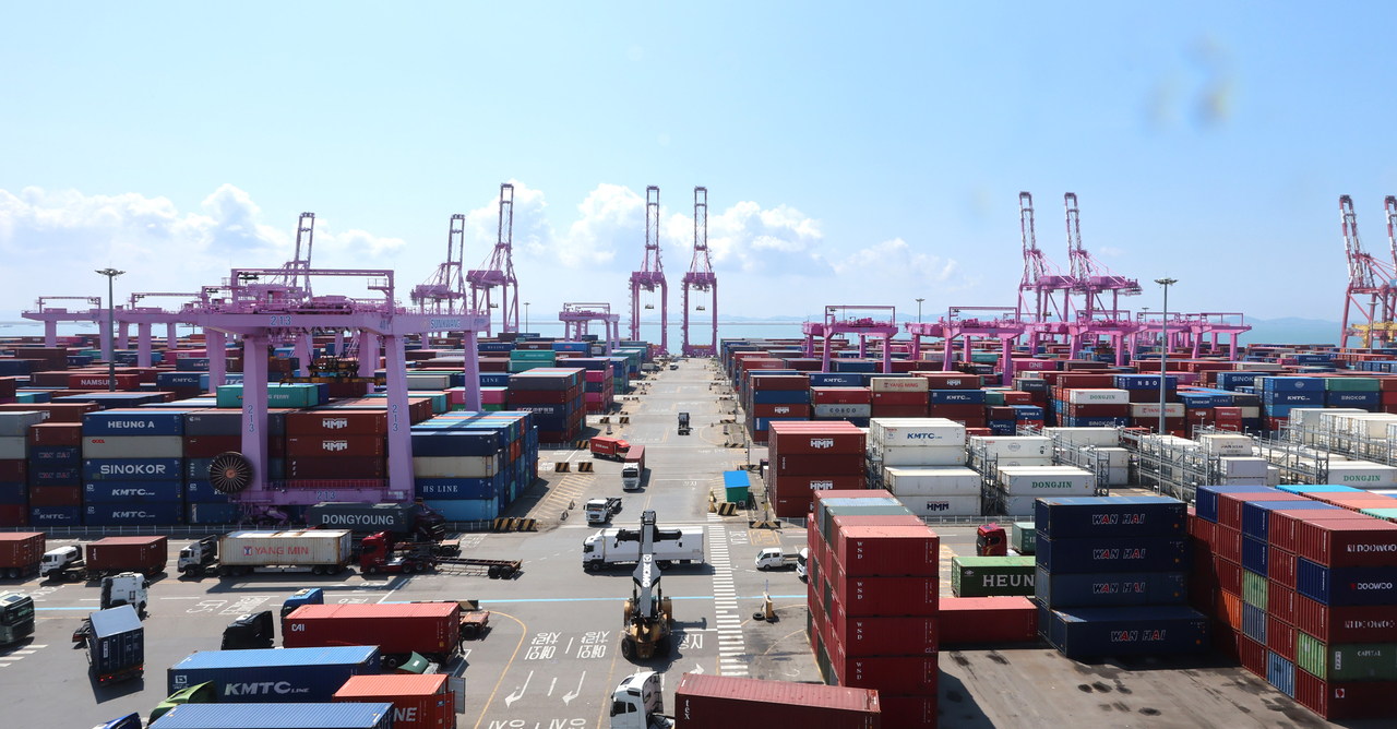 Containers are stacked at a port in Incheon on Tuesday. (Newsis)