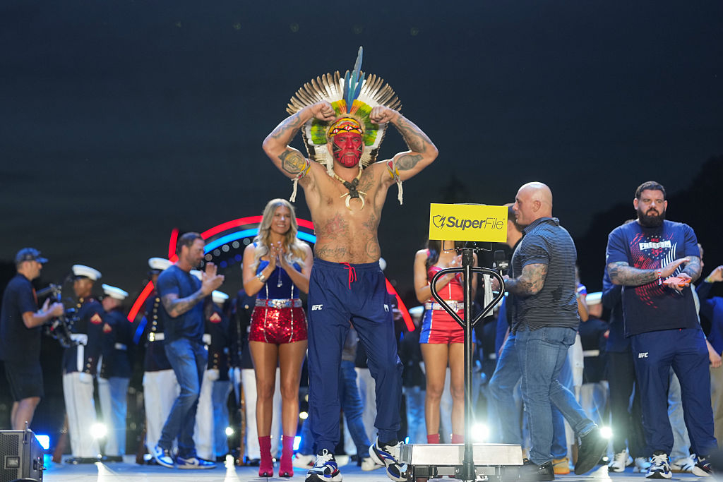 Alex Pereira poses in indigenous face paint at the open weigh-in on June 14, the day before the UFC White House event. [Getty Images]