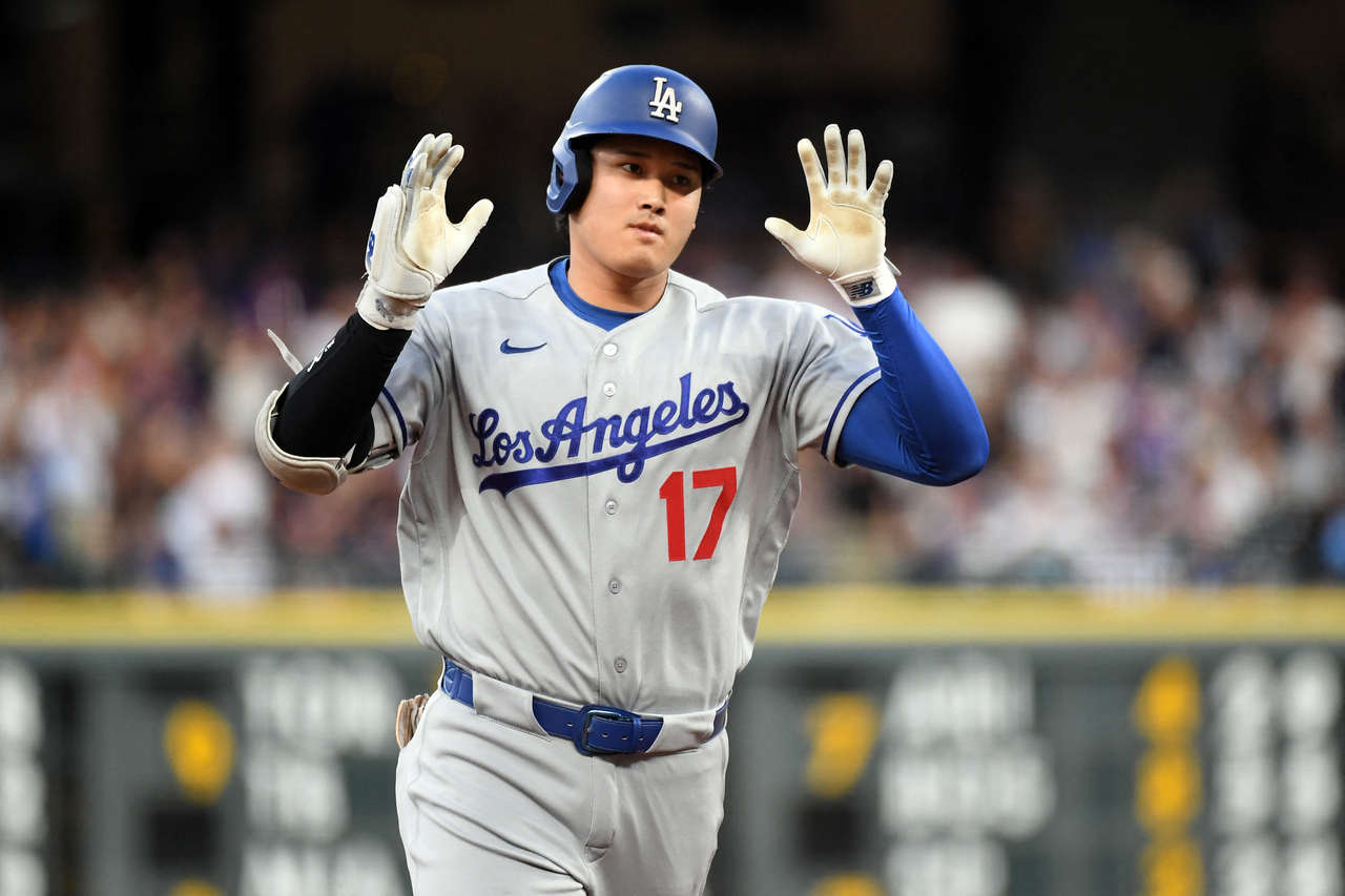 Los Angeles Dodgers' Shohei Ohtani runs the bases after a two-run home run against the Colorado Rockies, at Coors Field in Denver, Colorado, Tuesday.   (Reuters-Yonhap)