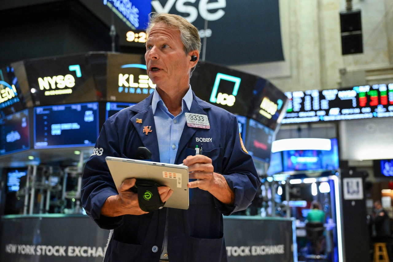 A trader works on the floor of the New York Stock Exchange. [AFP]