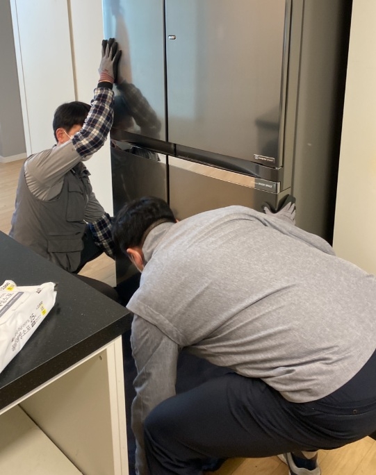 A refrigerator installation in progress