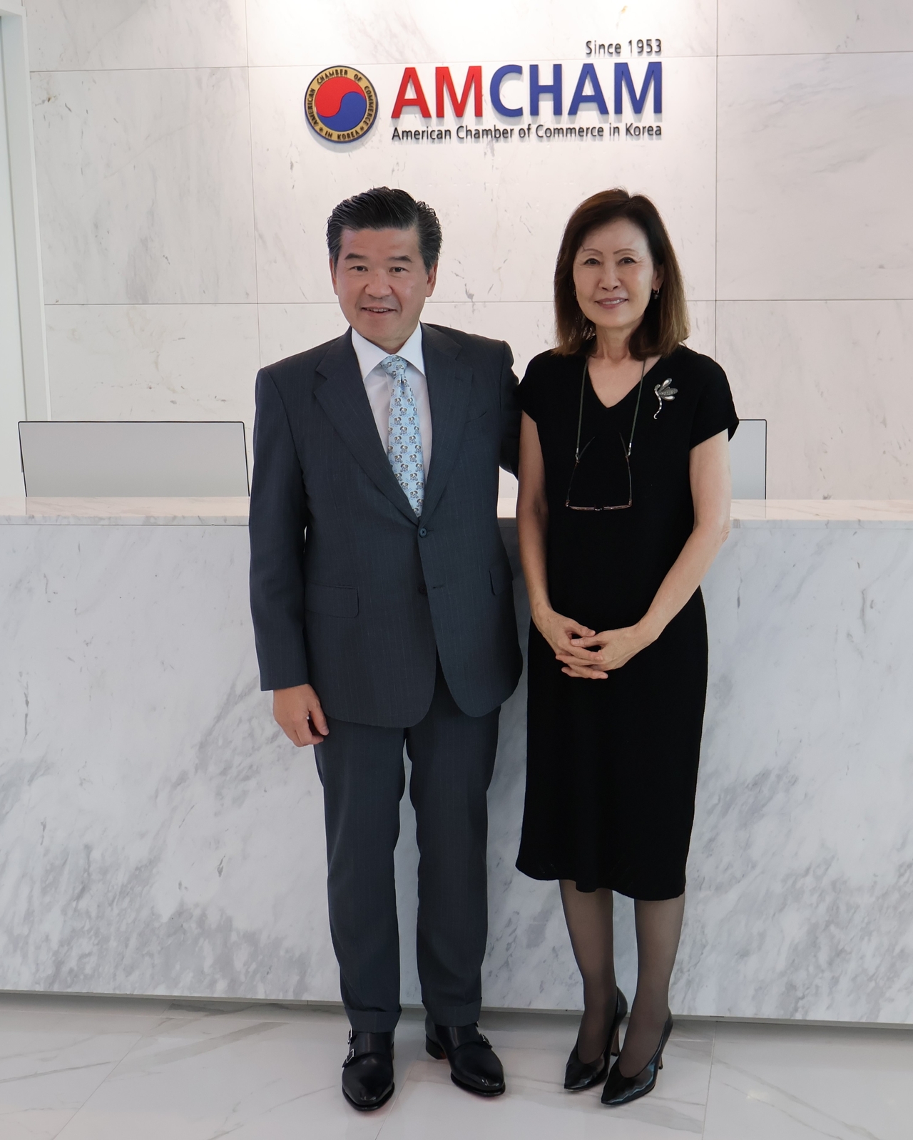 AmCham Chairman and CEO James Kim (left) and US Ambassador Michelle Steel pose for a photo at their first official meeting in Yeouido, Seoul, Thursday. (AmCham)
