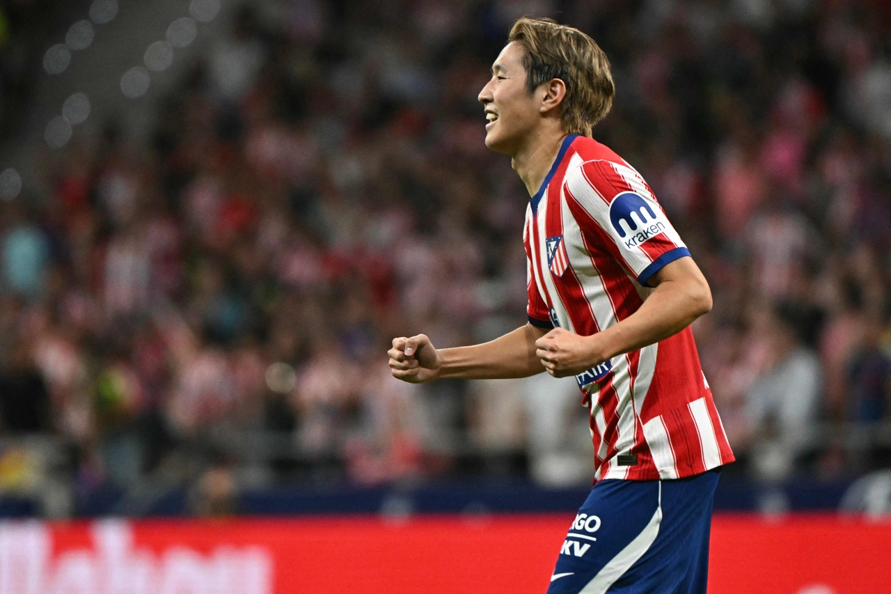 Atletico Madrid's South Korean midfielder #07 Lee Kang-in celebrates scoring their first goal during the Spanish league football match agaomst Malaga CF at the Metropolitano Stadium in Madrid on Aug. 19, 2026. (AFP-Yonhap)