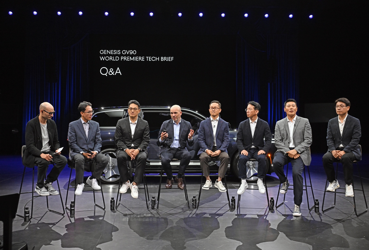 From left: Jared Pellat, Genesis North America communications representative; Heo Gwang-hun, executive director of Genesis development; Ahn Se-jin, executive director of Genesis Project Studio 2; Manfred Harrer, president and head of R&D; Lee Dae-hee, head of the Genesis body design division; Lee Seung-mok, executive director of integrated safety development; Jeong Seong-gi, head of Genesis test division 1; Jeong Jae-heon, head of the Genesis manufacturing engineering division. [Genesis]