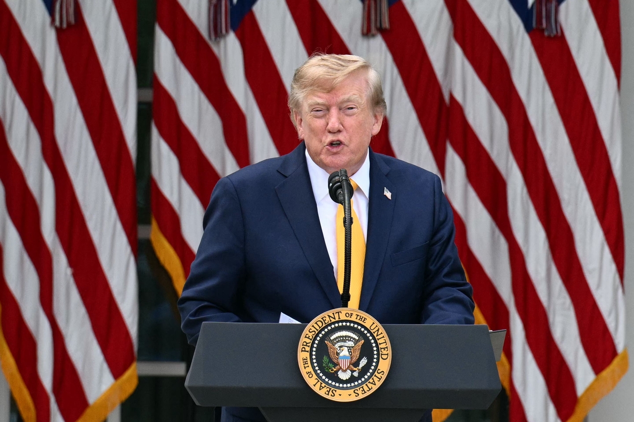 US President Donald Trump arrives to speak in the Rose Garden of the White House in Washington, DC, on Aug. 24 (US time). (AFP-Yonhap)