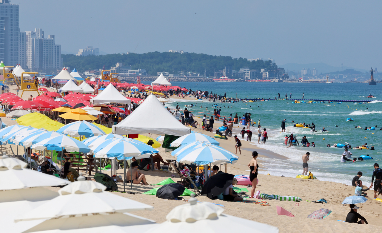 Gyeongpo Beach in the eastern port city of Gangneung, Gangwon Province, is crowded with people, in this file photo from Aug. 2, 2026. (Yonhap)