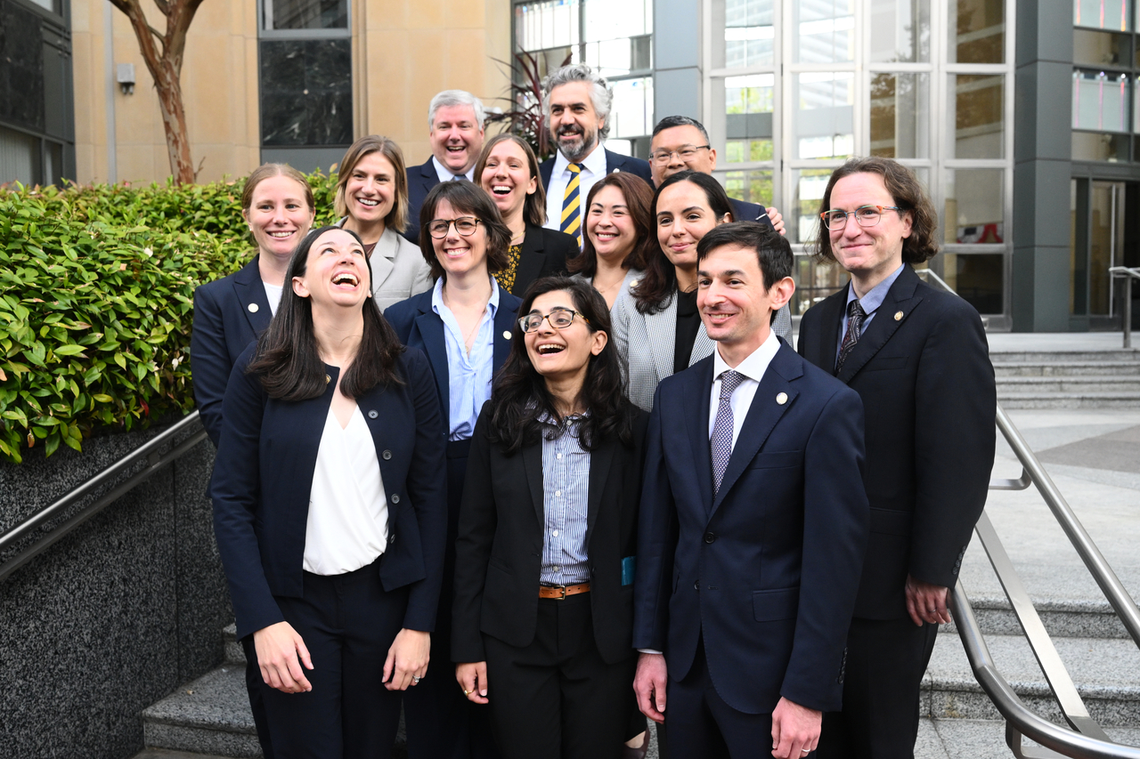 Members of California's legal team gather outside court after a settlement was reached in a multi-state lawsuit accusing Meta of causing harm to children on social media in Oakland, California, Wednesday. (AP-Yonhap)