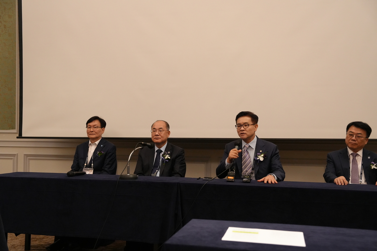 From left: The Korean Council for University Education's executive board members Gyeongkuk National University President Chung Tai-joo, Pusan National University President Choi Jae-weon, Hanyang University President Lee Ki-jeong and Inje University President Jeon Min-hyon speak to reporters Friday during the KCUE's summer seminar at a hotel in Seogwipo, Jeju Island. (KCUE)