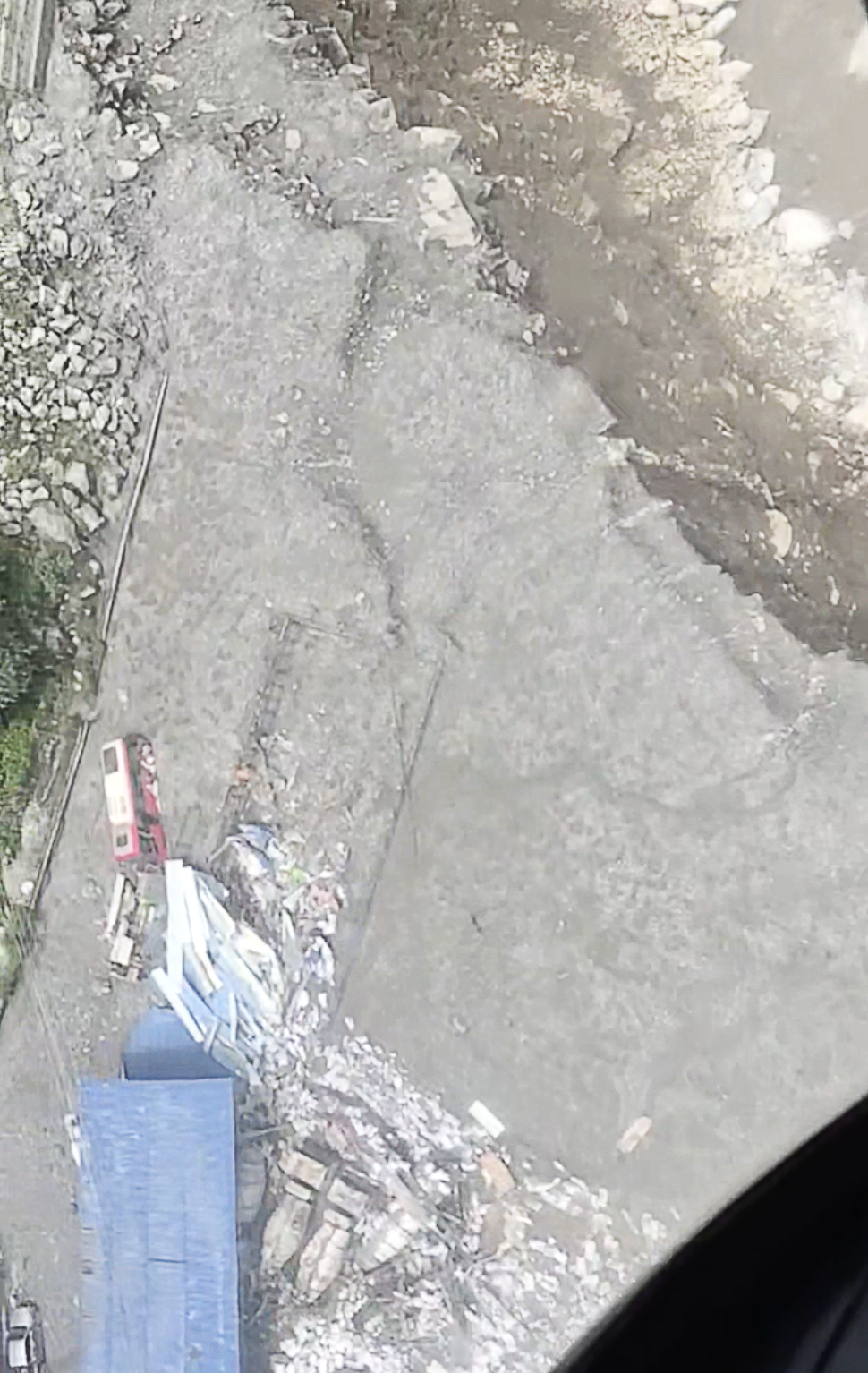 A flood-damaged area in Nepal is seen from a helicopter carrying South Korea's government rapid response team during a search operation on Saturday, in this photo provided by the team the following day. (Courtesy of government rapid response team)