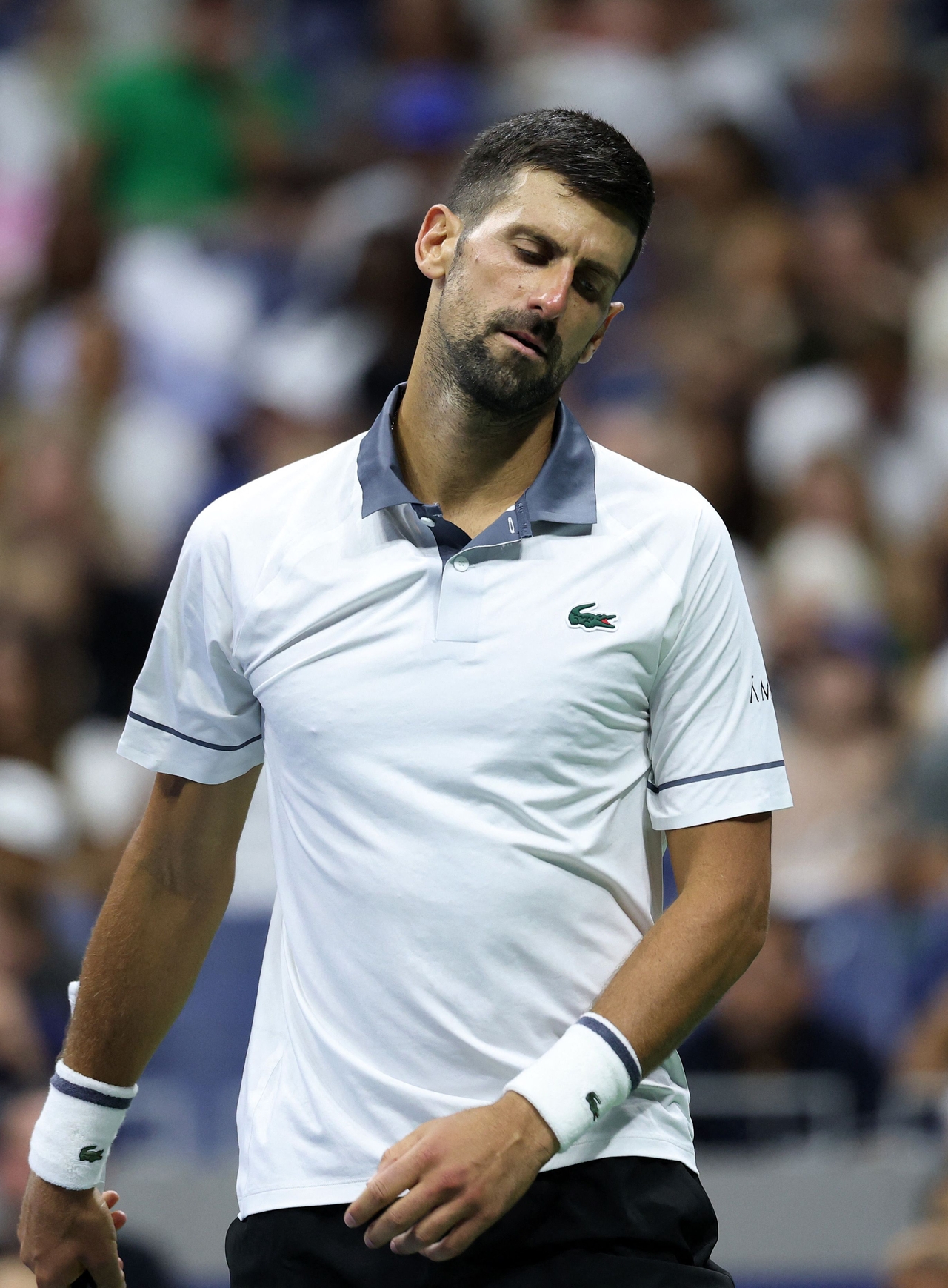 Novak Djokovic reacts during a match against Mariano Navone, at the 2026 US Open at USTA Billie Jean King National Tennis Center in New York City, Sunday.   (AFP-Yonhap)
