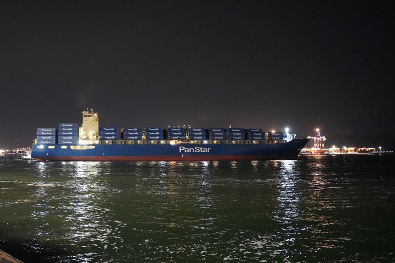The PanStar Acro, a container ship conducting a trial voyage through the Northern Sea Route, departs Busan New Port at 9:25 p.m. on Aug. 22. (PanStar Group)