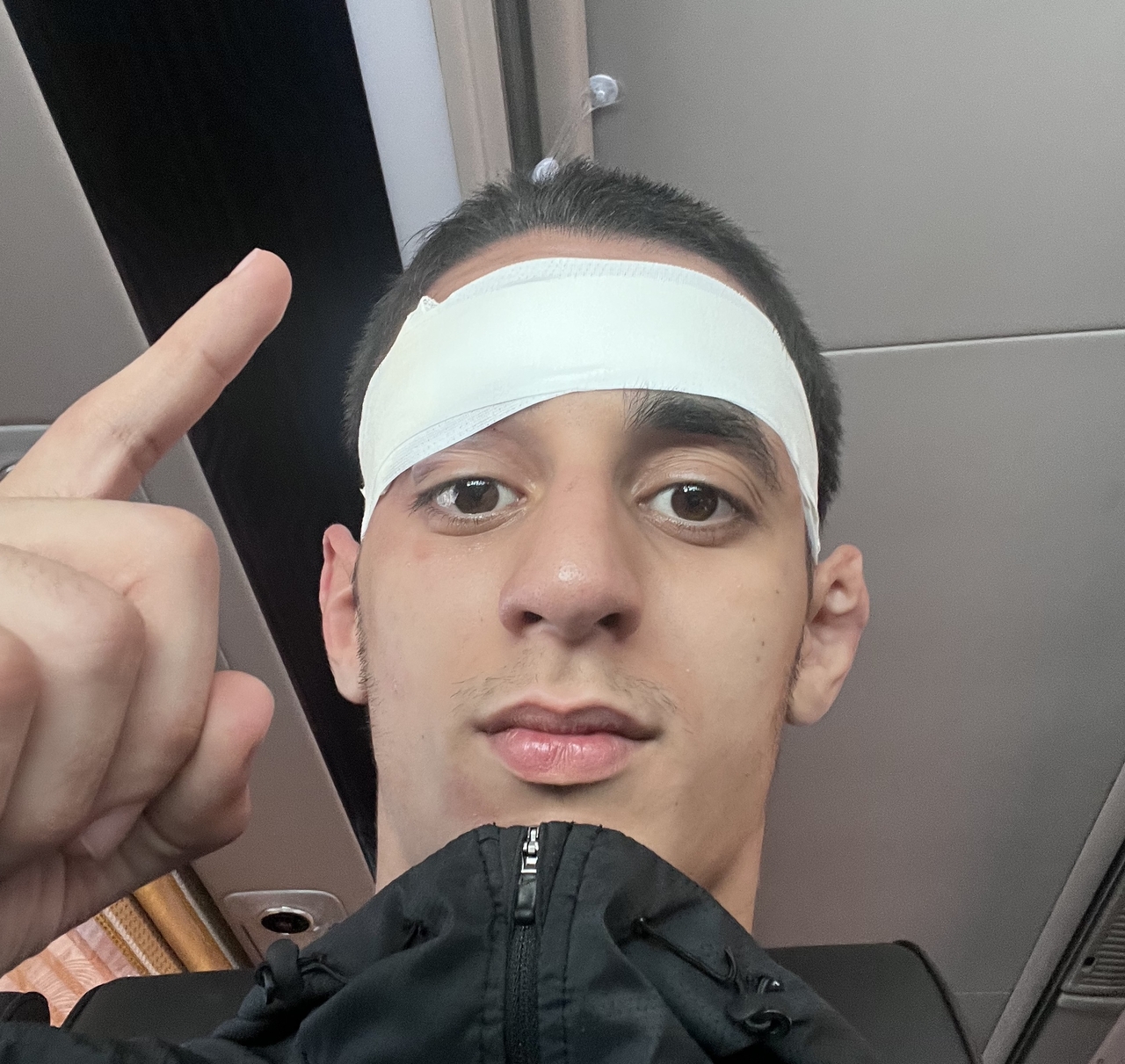 Fouda Faris Ahmed wears a bandage over a cut near his eye sustained during the men's Greco-Roman 63kg final at the 50th National University Wrestling Championships on Aug. 26. (Fouda Faris Ahmed)