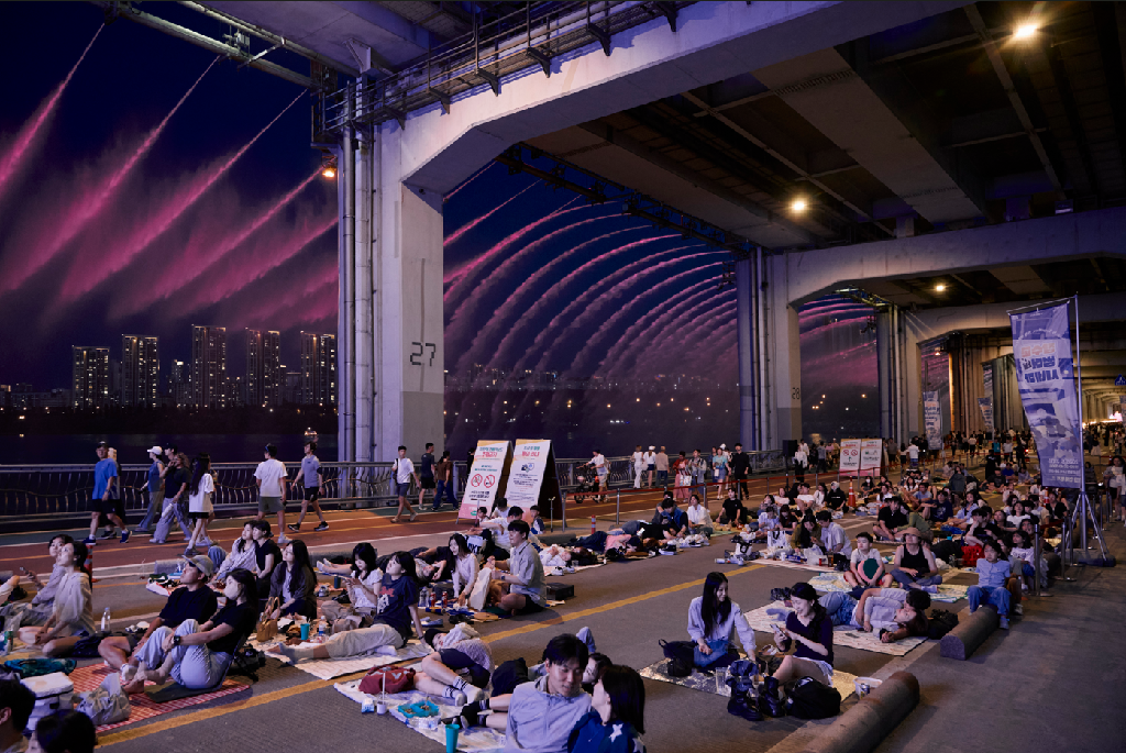 People gather on Jamsu Bridge for an outdoor movie screening on May 31 in Seoul. (Seoul Metropolitan Government)