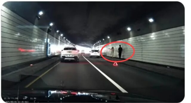 A woman and a man taking a wedding shoot inside Namsan Tunnel 3 (Threads)