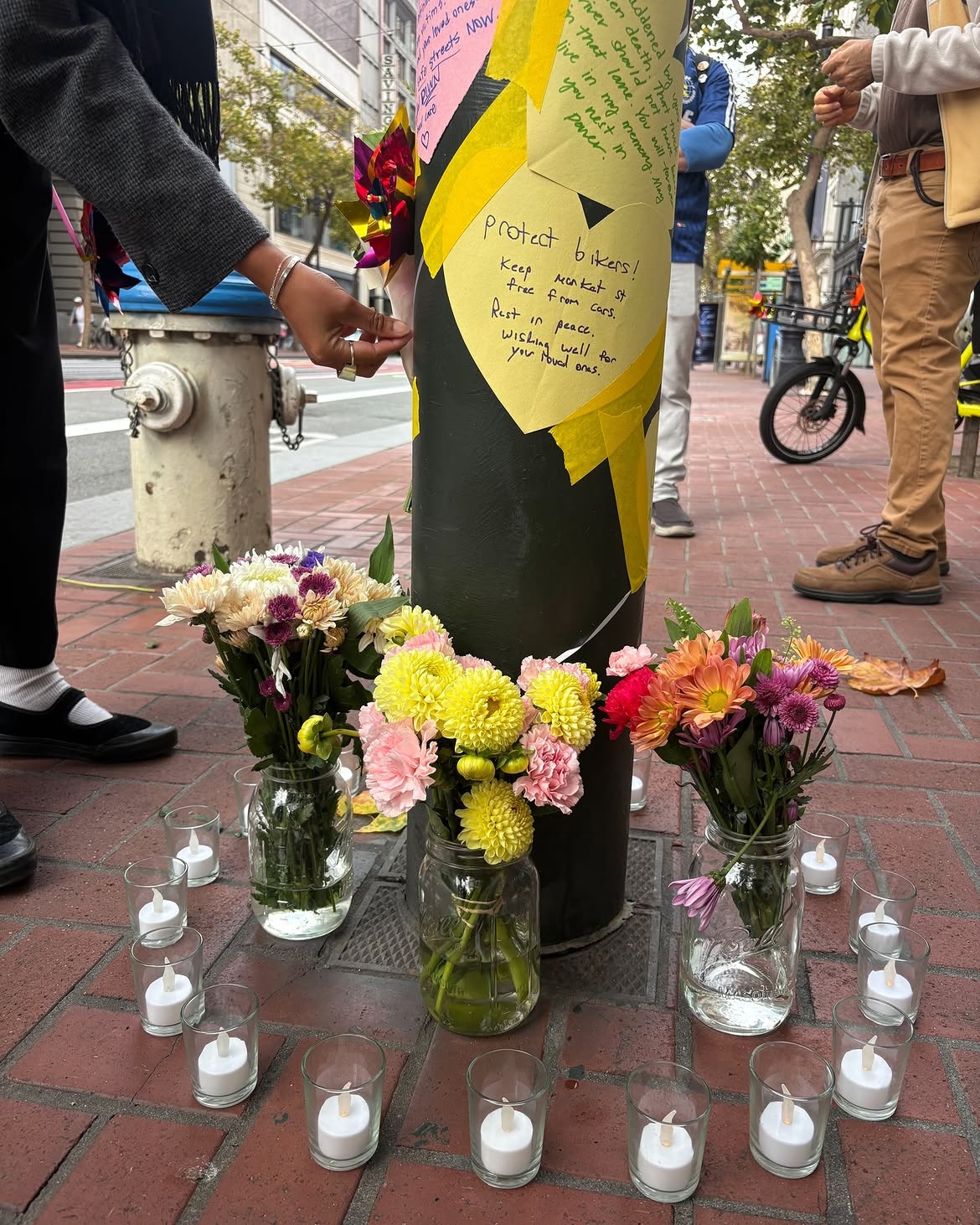 The San Francisco Bicycle Coalition holds a street vigil on Market Street last week to mourn the death of Kim Ye-bin. (@sfbike, Instagram)