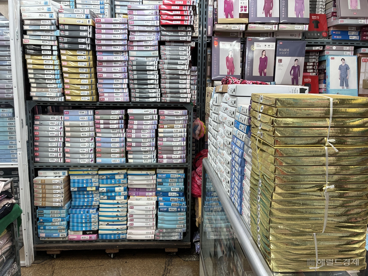 Unsold merchandise fills the walls and display racks of a clothing and accessories store at Yeongdeungpo Jungang Market in Seoul. (Kim Seo-hyeon)