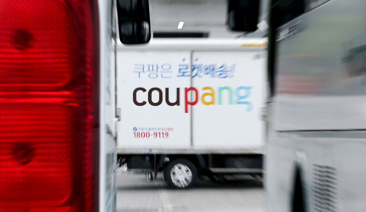 This file photo taken on June 11, shows a Coupang delivery truck in Seoul. (Yonhap)