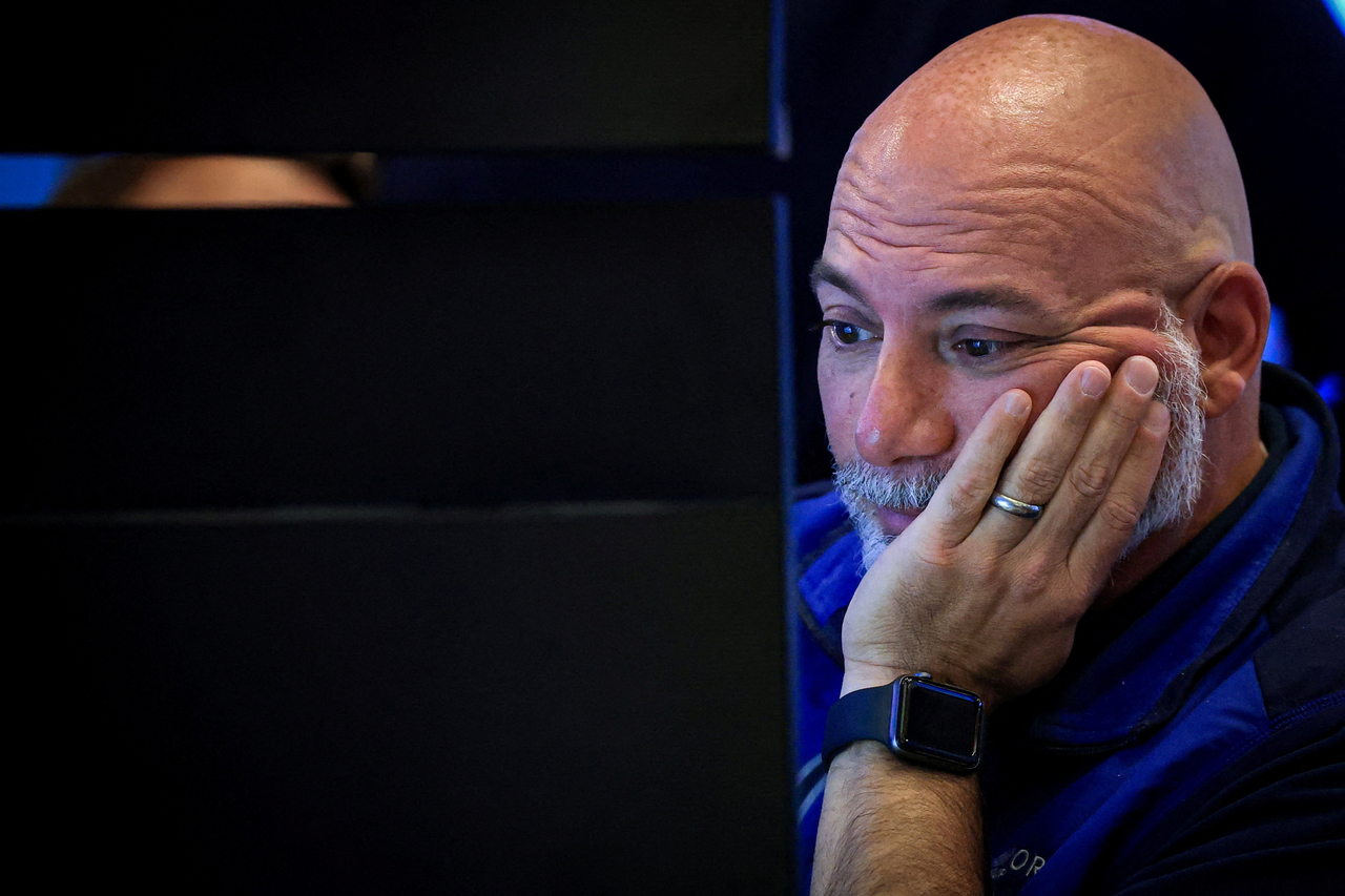 A trader monitors market data on screens at the New York Stock Exchange. [Reuters]