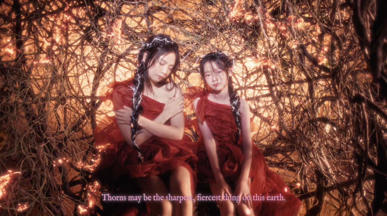 Jennie (left) is seen in the music video for "Fallen Angel," released on Aug. 28. (Odd Atelier)
