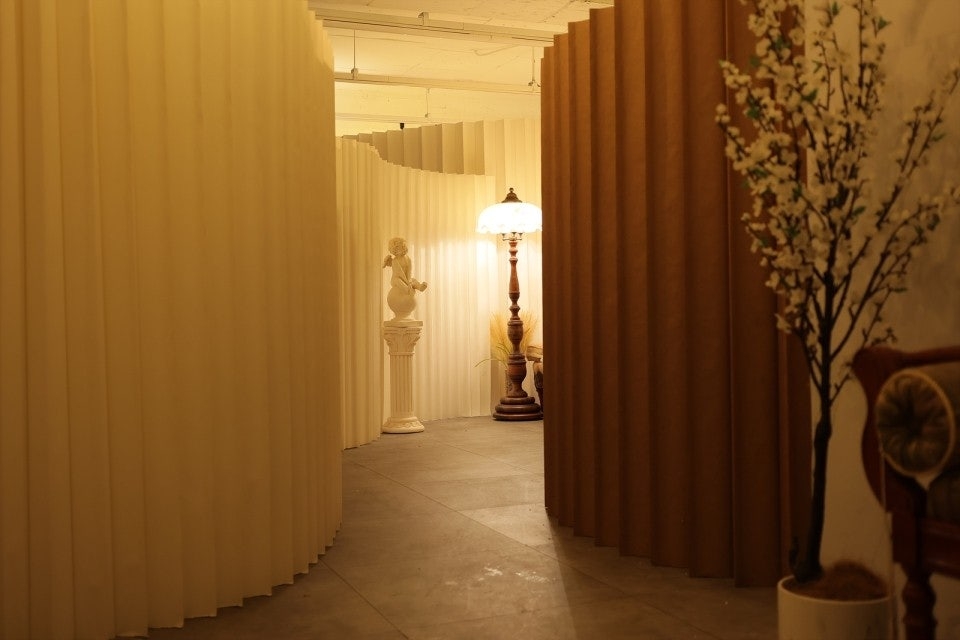 The interior of a sex doll showroom in Eunpyeong-gu, Seoul, is decorated with sculptures, flowers and other ornaments. (Showroom operator Lee)