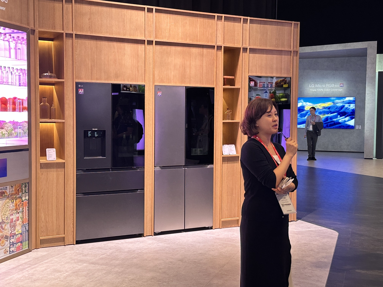 Koo Ji-young, LG Electronics' vice president of kitchen solution customer experience, explains the Fit&Max refrigerator, which can be installed with just 4 millimeters of clearance.