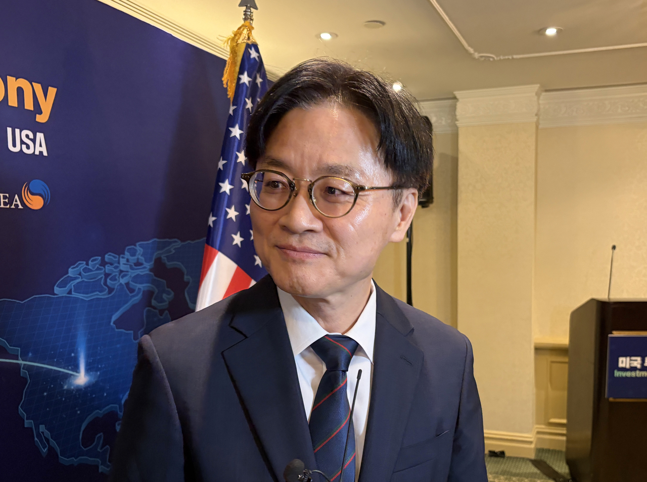 Industry Minister Kim Jung-kwan answers questions from reporters in Washington, DC on Thursday. (Yonhap)