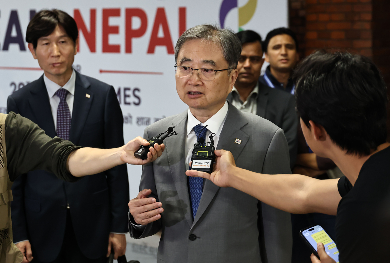 Foreign Minister Cho Hyun speaks to reporters after arriving at Tribhuvan International Airport in Kathmandu, Nepal, on Saturday. (Yonhap)