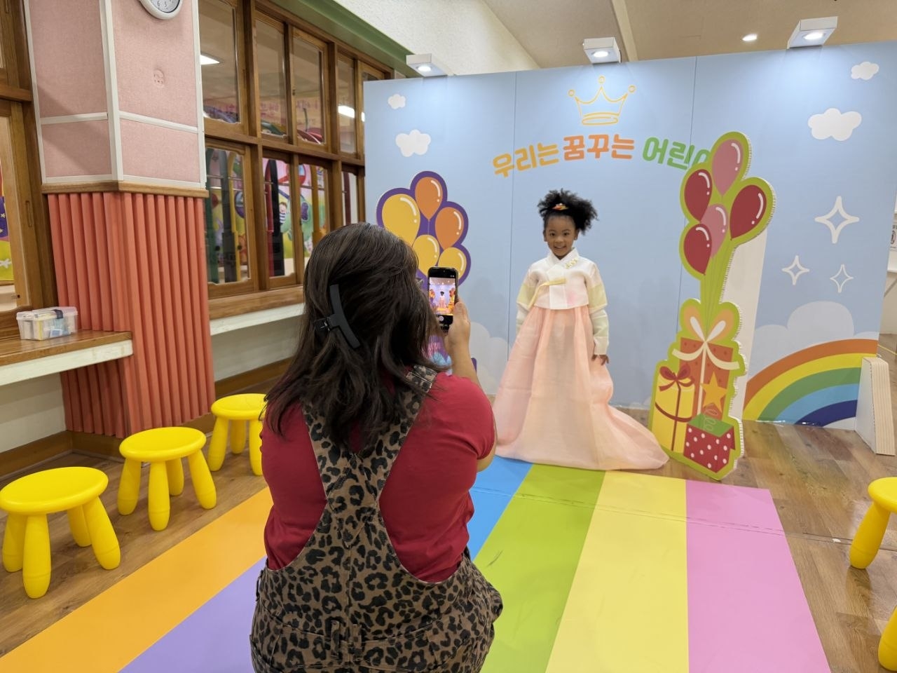 Participants at a cultural exchange event held by the Gyeonggi Provincial Office of Education for young children from Korean and American families affiliated with Camp Humphreys take a photo wearing Hanbok on Saturday in Pyeongtaek, Gyeonggi Province. (The Gyeonggi Provincial Office of Education)