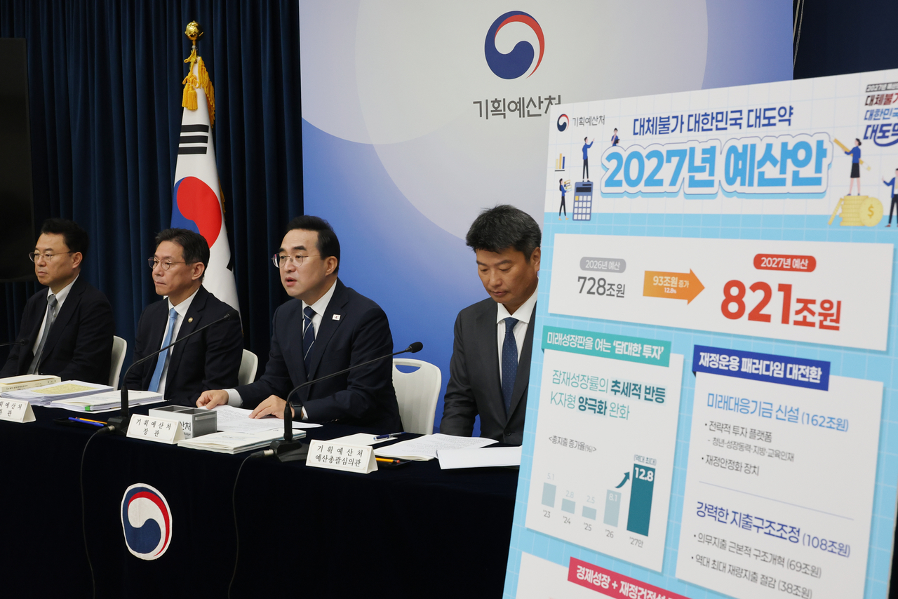 Minister of Planning and Budget Park Hong-keun briefs reporters at Government Complex Sejong on Aug. 28 on the 2027 budget proposal and the 2026–2030 national fiscal management plan.