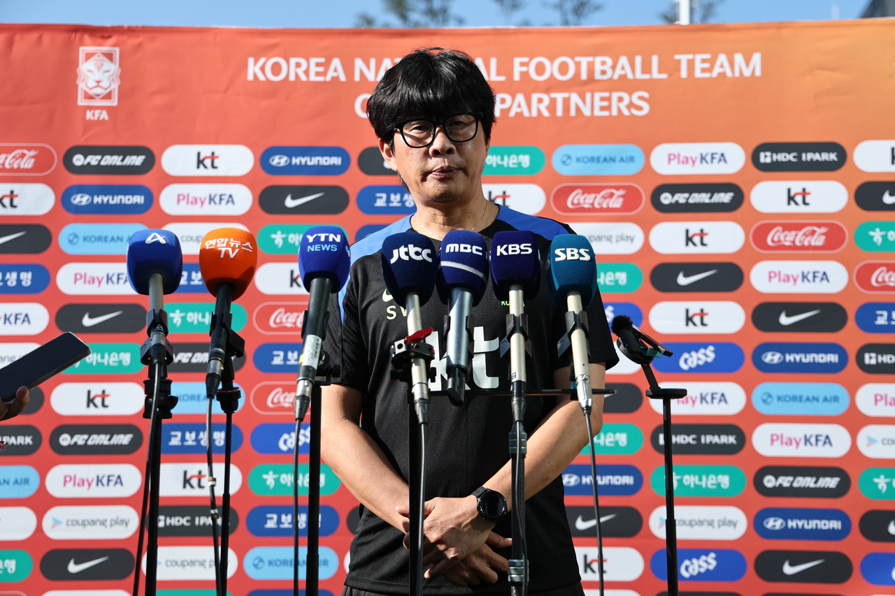 Shin Sang-woo, head coach of the South Korean women's national football team, speaks to reporters before a training session for the Asian Games at Korea Football Park in Cheonan, South Chungcheong Province, on Sept. 7, 2026. (Yonhap)