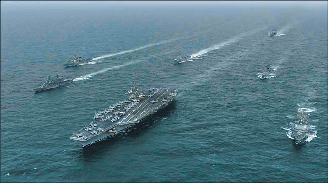 File photo of a South Korea-US-Japan maritime exercise. [Navy]