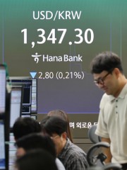 Won strengthens to 1,330s against dollar for first time in nearly 2 years as chipmakers convert earnings