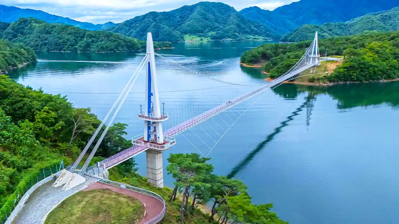 The Sangmuryong suspension bridge, which connected the remote village to the outside world, serves both tourism and everyday use.