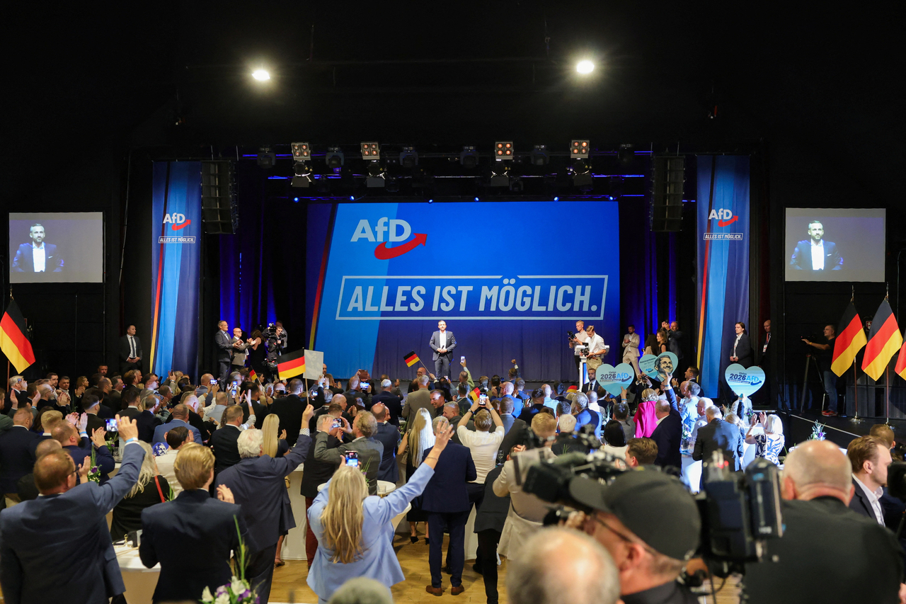 People cheer exit poll results at an election night event for the far-right Alternative for Germany party in Magdeburg, Germany, on Sunday (local time).