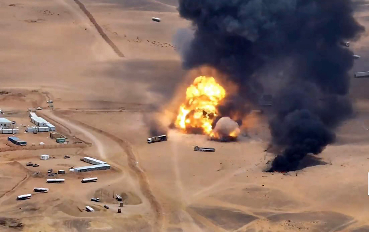 Houthi rebels bombard Saudi military equipment with a missile. [UPI]