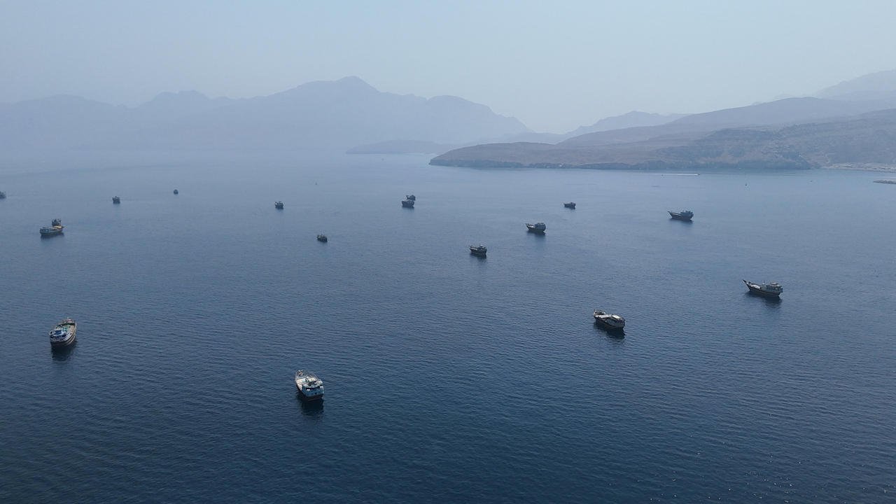A drone view shows vessels near the Strait of Hormuz, as seen from Musandam, Oman, on Aug. 28. (Reuters)