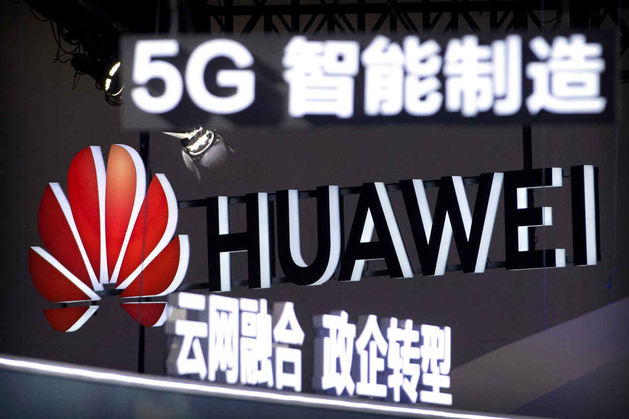 Promotional materials for Chinese tech firm Huawei's 5G wireless technology are displayed at the PT Expo held in Beijing in September 2018. [AP]
