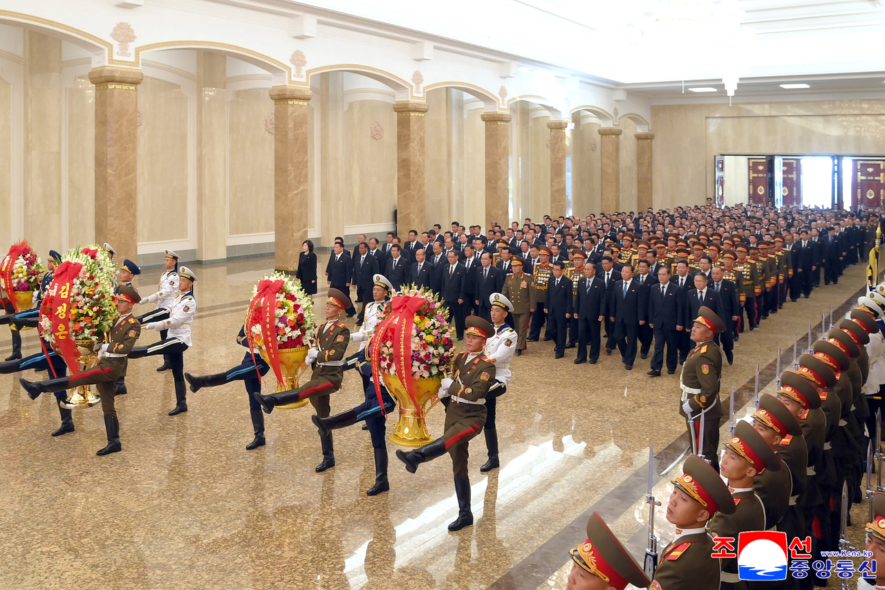 North Korean government and party officials visit the Kumsusan Palace of the Sun in Pyongyang on Tuesday, to pay tribute to North Korea's founder, Kim Il-sung, and his son Kim Jong-il, marking the 78th anniversary of the country's founding. The mausoleum enshrines the mummified bodies of Kim Il-sung and Kim Jong-il. (KCNA via Yonhap)
