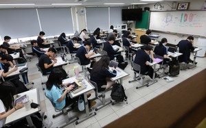 Korean students still near top of PISA rankings despite fall in reading
