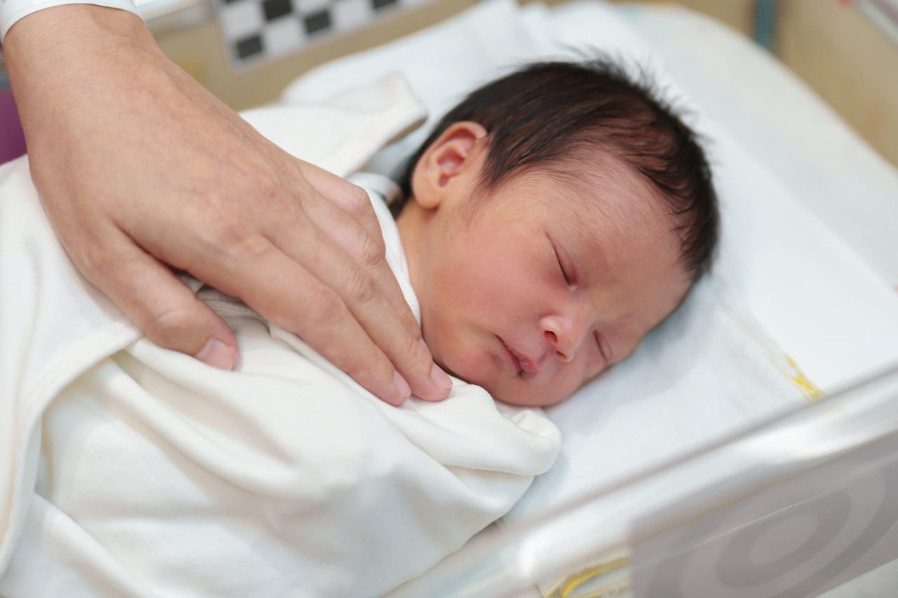 A stock photo of a newborn baby (123rf)
