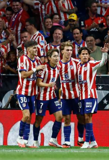 Atletico Madrid's Lee Kang-in celebrates with teammates after scoring against Malaga, at Riyadh Air Metropolitano in Madrid, Aug. 19.  　(Reuters-Yonhap)