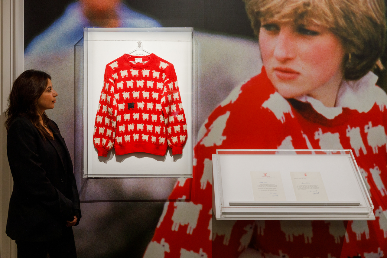 Princess Diana's "Black Sheep" sweater is presented at a Sotheby's auction in London in July 2023. [Getty Images]